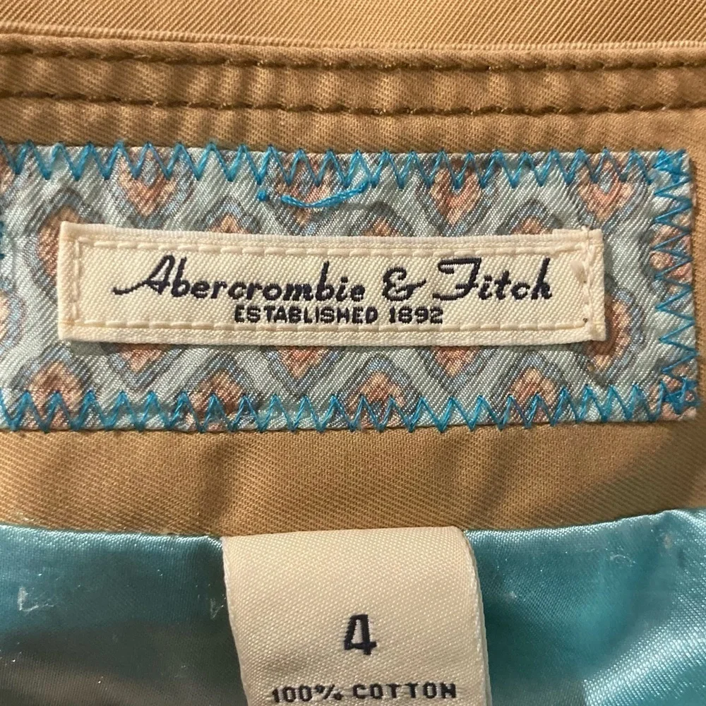 Vintage Y2K Abercrombie & Fitch tan micro mini skirt wrap skirt button front. 4